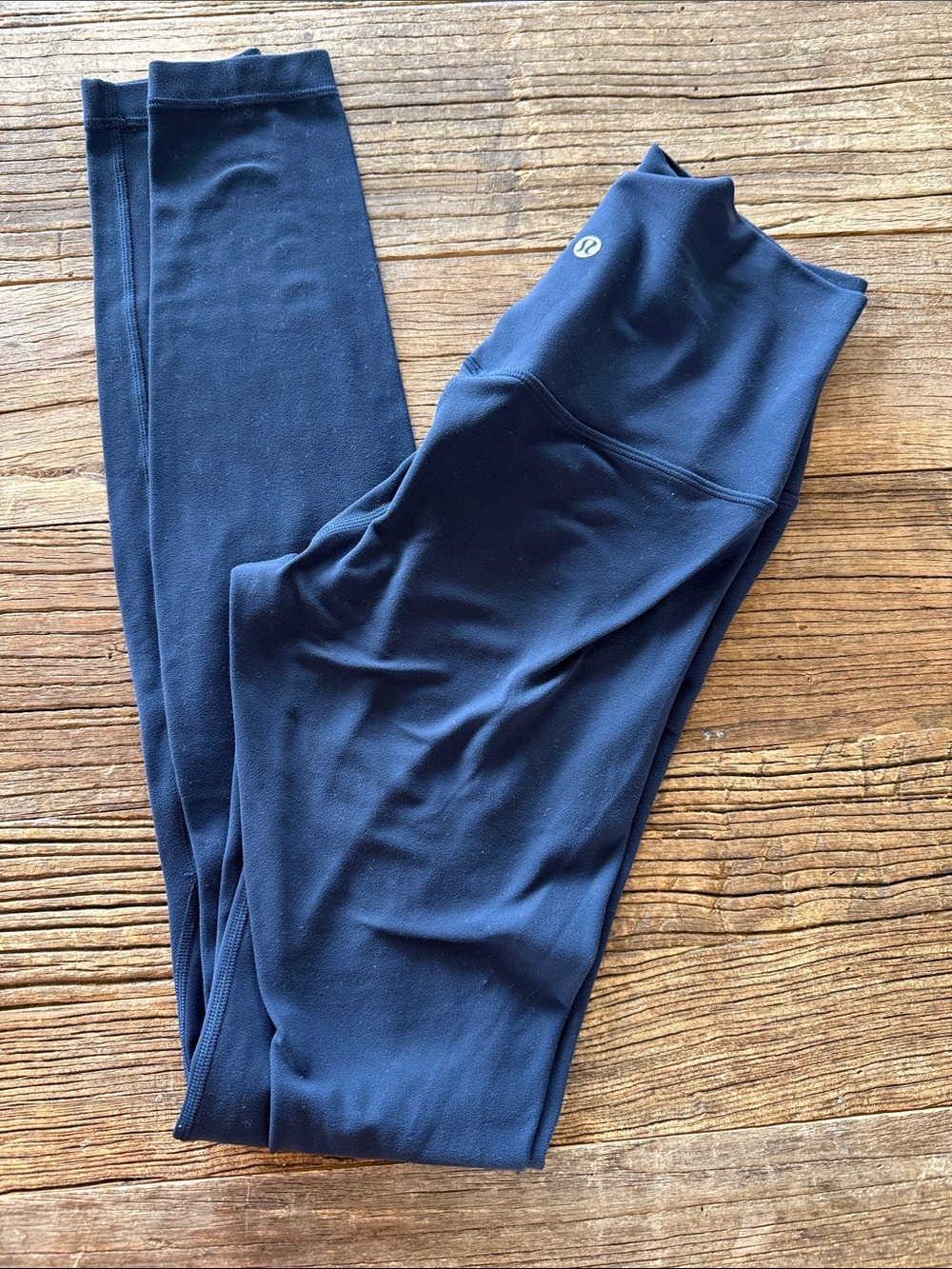lululemon navy blue athletic top with logo